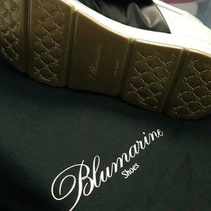 White/ black sneakers